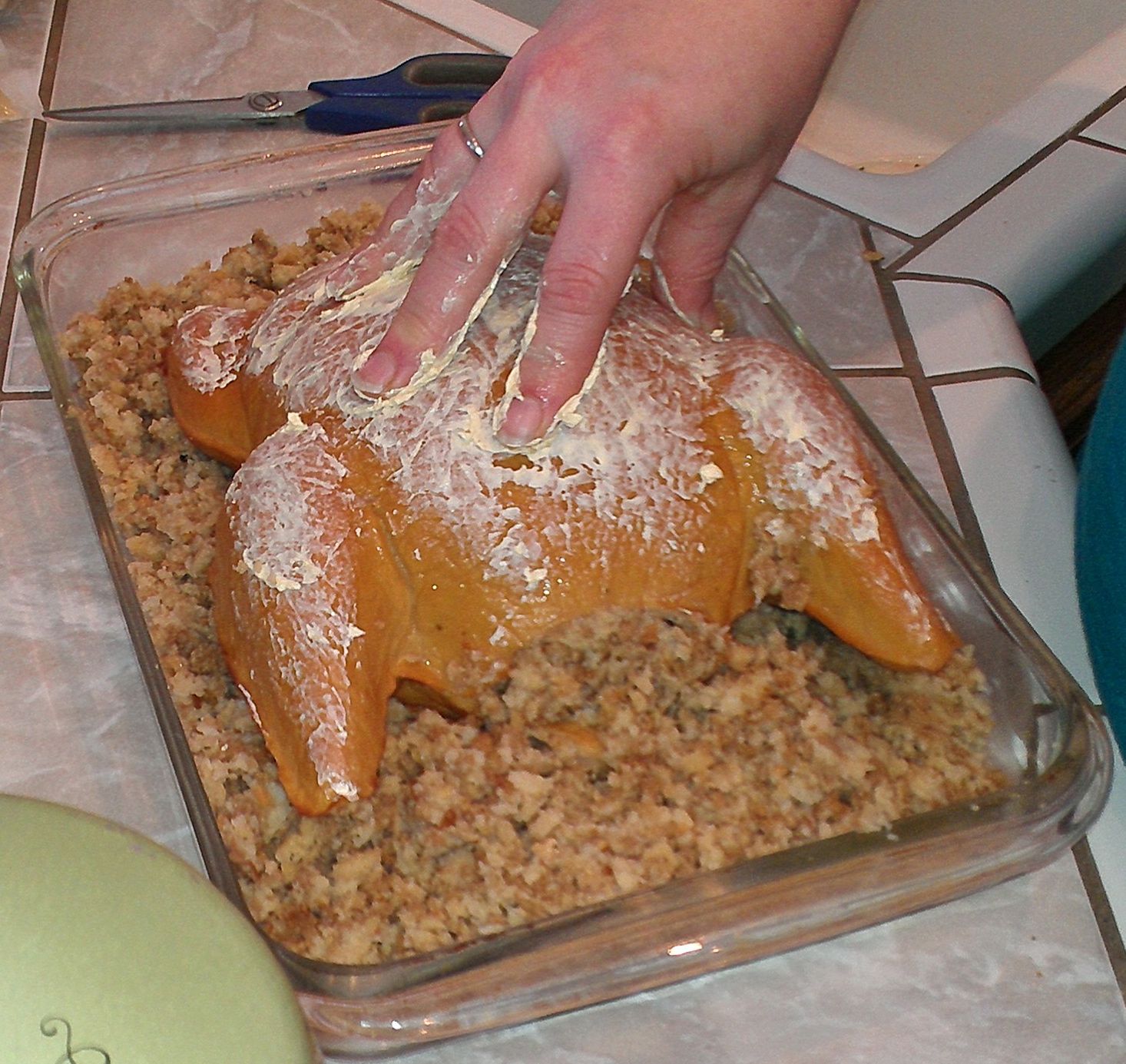 Vegetarian Plus Vegan Turkey being stuffed and prepared