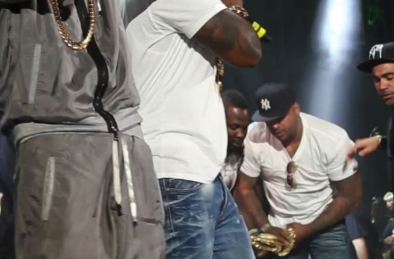 Melee ensued at Summer Jam during 50 Cent & Fabolous performance of the Cuffing Season remix.  Slow of urban brand Slow Bucks emerged chainless