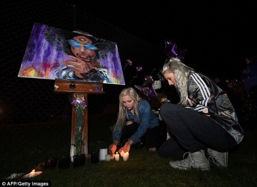 Prince painting at Paisley Park memorial